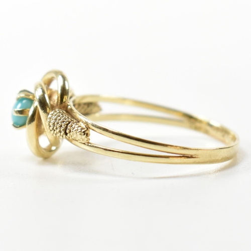 378 - A 14ct gold and blue stone ring. The 14ct gold ring having a central twist design set with a round b... 