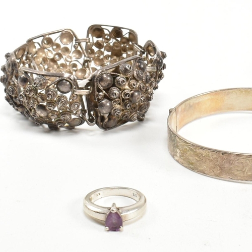 380 - A collection of silver and gem set jewellery. The jewellery to include a hallmarked silver engraved ... 