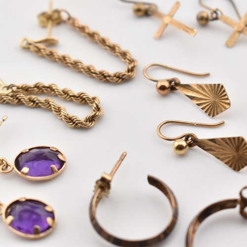 388 - A collection of 9ct gold and gem set earrings and 9ct gold butterfly back fasteners. The lot to incl... 