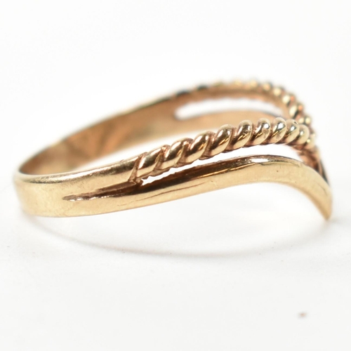 397 - A hallmarked 9ct gold two strand wishbone ring. The pierced 9ct gold wishbone ring having a twisted ... 