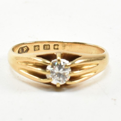 401 - A hallmarked 18ct gold and diamond ring. The ring having a claw mounted round brilliant cut diamond.... 