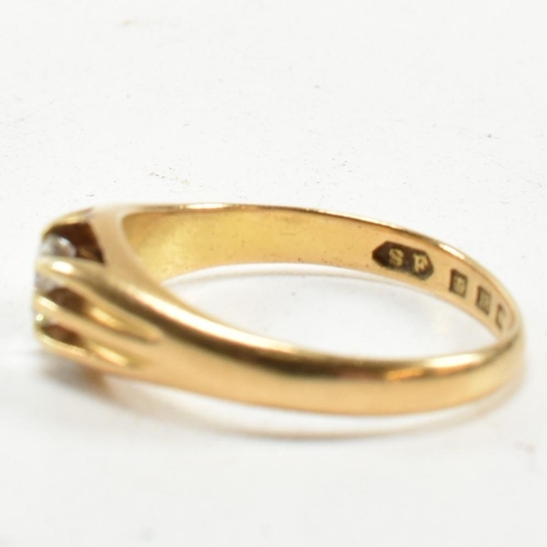 401 - A hallmarked 18ct gold and diamond ring. The ring having a claw mounted round brilliant cut diamond.... 