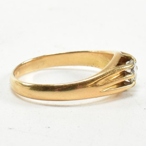 401 - A hallmarked 18ct gold and diamond ring. The ring having a claw mounted round brilliant cut diamond.... 