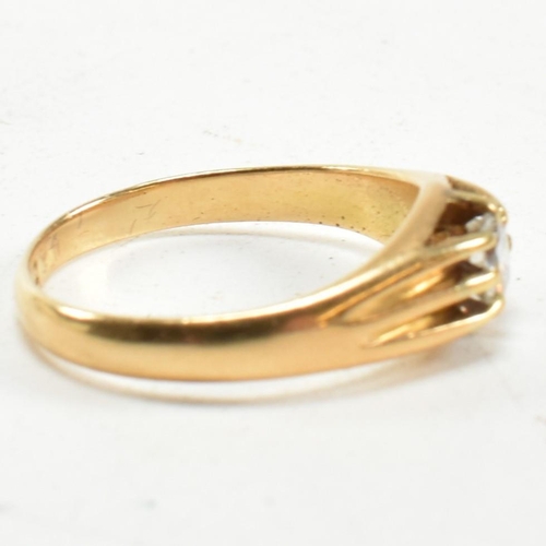 401 - A hallmarked 18ct gold and diamond ring. The ring having a claw mounted round brilliant cut diamond.... 