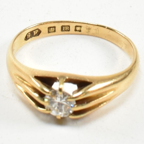 401 - A hallmarked 18ct gold and diamond ring. The ring having a claw mounted round brilliant cut diamond.... 