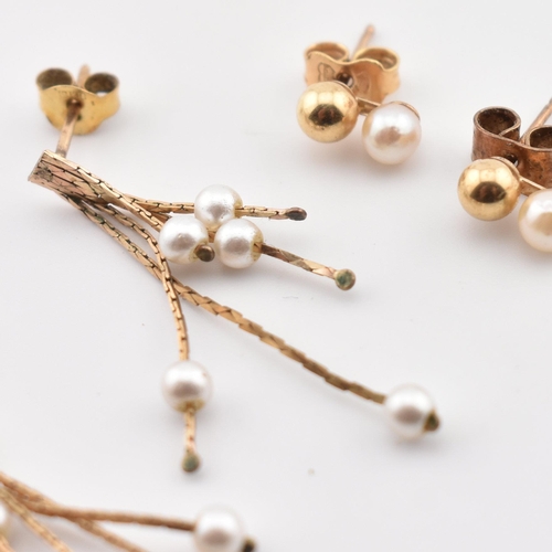 404 - Two pairs of 9ct gold and pearl earrings. The earrings to include a pair of 9ct gold and pearl snake... 