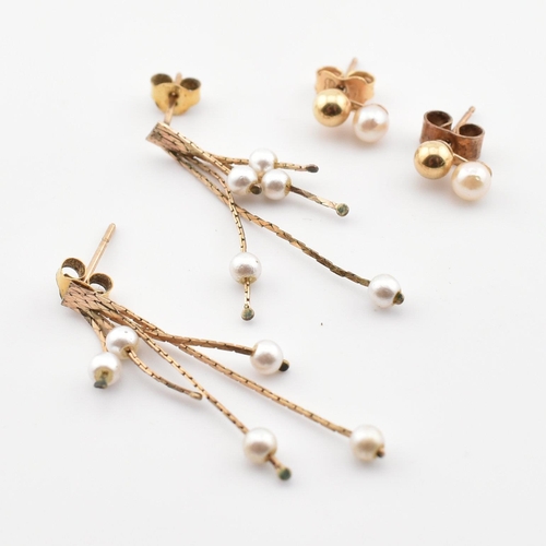 404 - Two pairs of 9ct gold and pearl earrings. The earrings to include a pair of 9ct gold and pearl snake... 