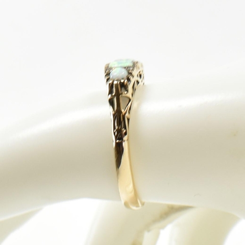 411 - A 9ct gold, synthetic opal and diamond gypsy ring. Stamped 9ct. Size Q. Weighs 2.6g. All weights, me... 