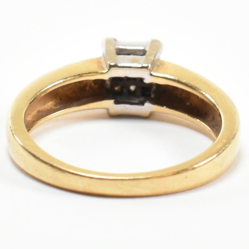 43 - A hallmarked 18ct gold and diamond cluster ring. The ring set with six princess cut diamonds to a sq... 