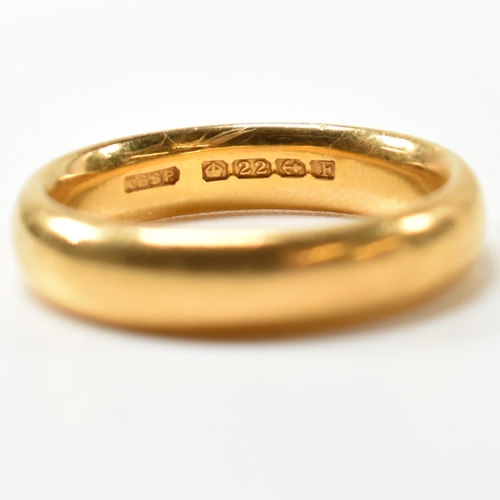 44 - A hallmarked 22ct gold band ring. The band ring hallmarked for Birmingham, 1930. Maker's mark KBSP. ... 