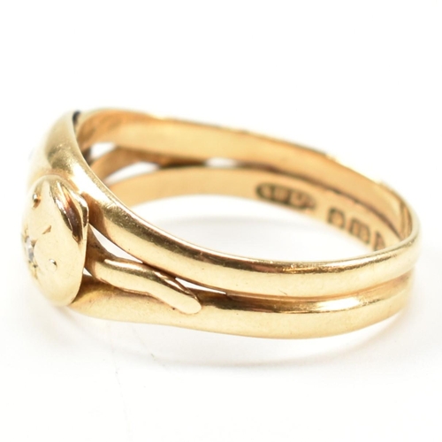 46 - An Edwardian hallmarked 18ct gold and diamond twin snake ring. The ring in the form of two coiled sn... 