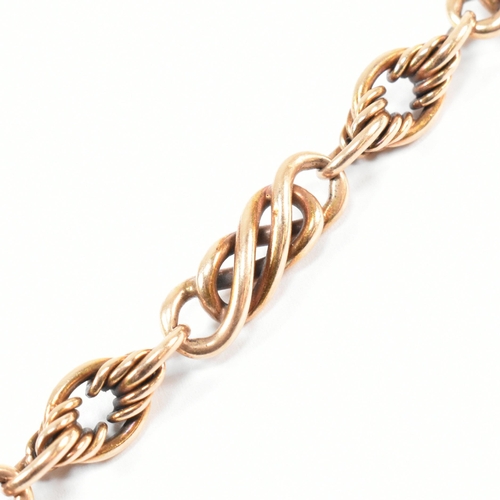 52 - Am Edwardian hallmarked 15ct gold Albert chain with T-bar. The Albert chain having a mixed link chai... 