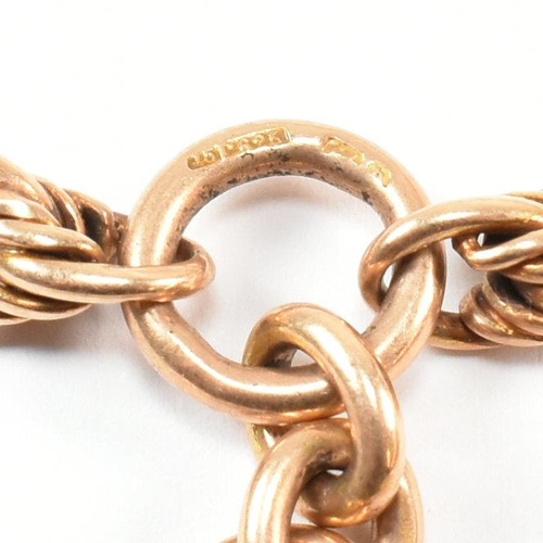 52 - Am Edwardian hallmarked 15ct gold Albert chain with T-bar. The Albert chain having a mixed link chai... 