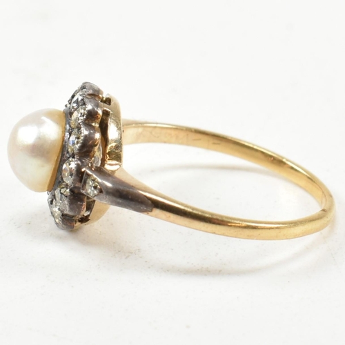 53 - An early 20th century pearl and diamond cluster ring. The ring set with a central half pearl framed ... 