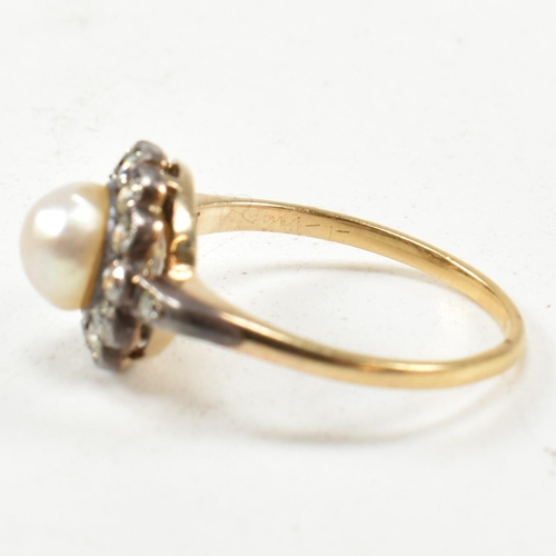 53 - An early 20th century pearl and diamond cluster ring. The ring set with a central half pearl framed ... 