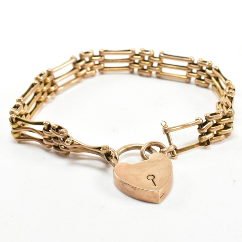 54 - An Edwardian hallmarked 9ct gold gate link bracelet with a heart padlock clasp. The 9ct gold gate li... 