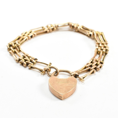 54 - An Edwardian hallmarked 9ct gold gate link bracelet with a heart padlock clasp. The 9ct gold gate li... 