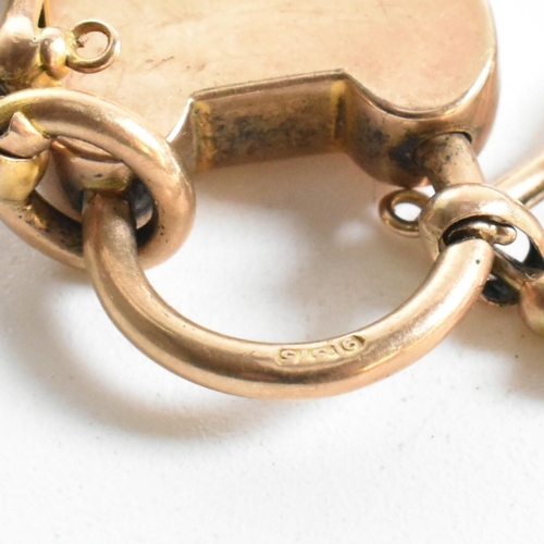 54 - An Edwardian hallmarked 9ct gold gate link bracelet with a heart padlock clasp. The 9ct gold gate li... 