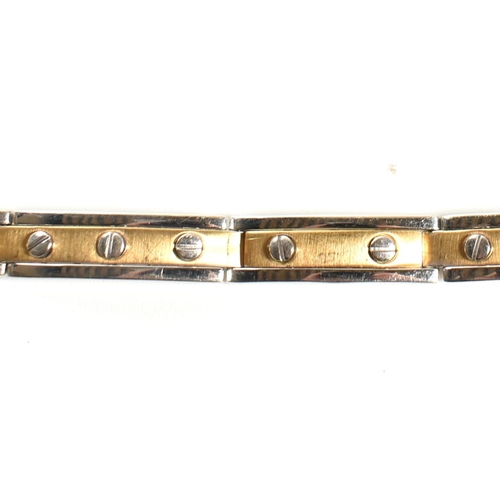 55 - An Italian 18ct gold screw detail link bracelet. The bracelet having two-tone yellow and white 18ct ... 