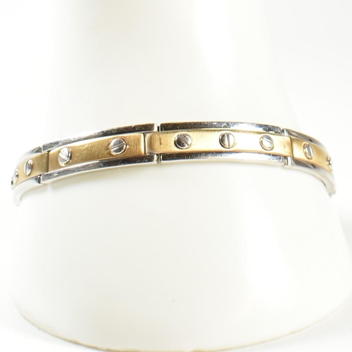 55 - An Italian 18ct gold screw detail link bracelet. The bracelet having two-tone yellow and white 18ct ... 