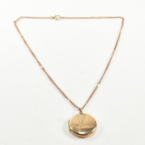 60 - A 9ct gold locket pendant necklace. The 9ct gold round engraved locket strung on a curb link chain n... 