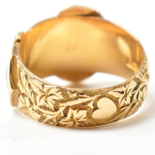 61 - An Edwardian hallmarked 18ct gold buckle ring. The 18ct gold belt buckle ring having an all-over fol... 