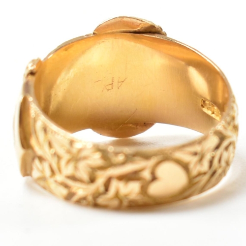 61 - An Edwardian hallmarked 18ct gold buckle ring. The 18ct gold belt buckle ring having an all-over fol... 