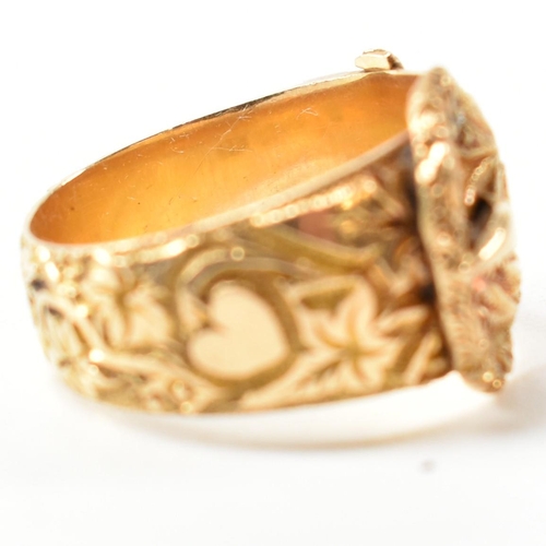 61 - An Edwardian hallmarked 18ct gold buckle ring. The 18ct gold belt buckle ring having an all-over fol... 