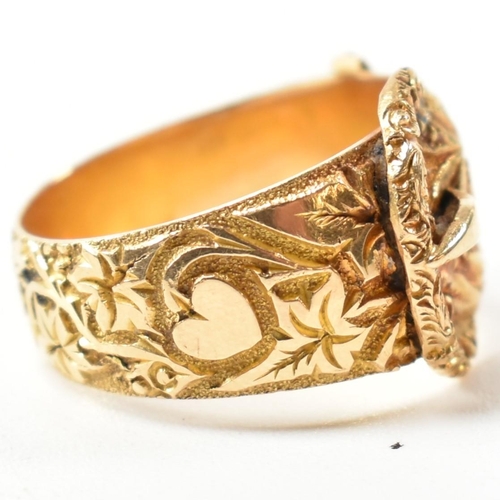 61 - An Edwardian hallmarked 18ct gold buckle ring. The 18ct gold belt buckle ring having an all-over fol... 