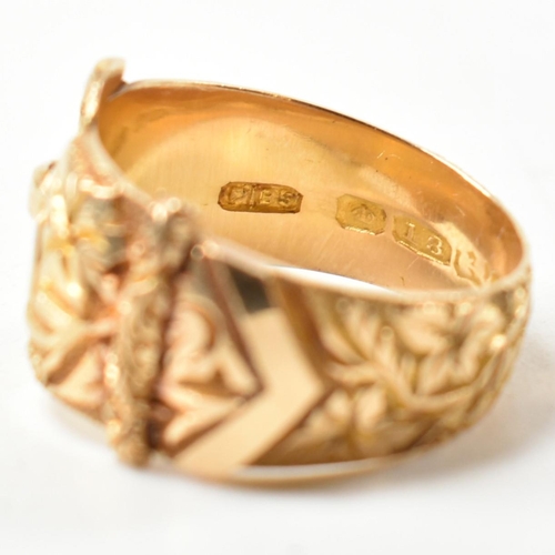 61 - An Edwardian hallmarked 18ct gold buckle ring. The 18ct gold belt buckle ring having an all-over fol... 