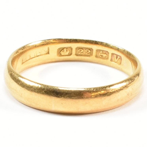 65 - A hallmarked 22ct gold band ring. Hallmarked for Birmingham, 1945. Sponsor's mark rubbed. Size P.5. ... 