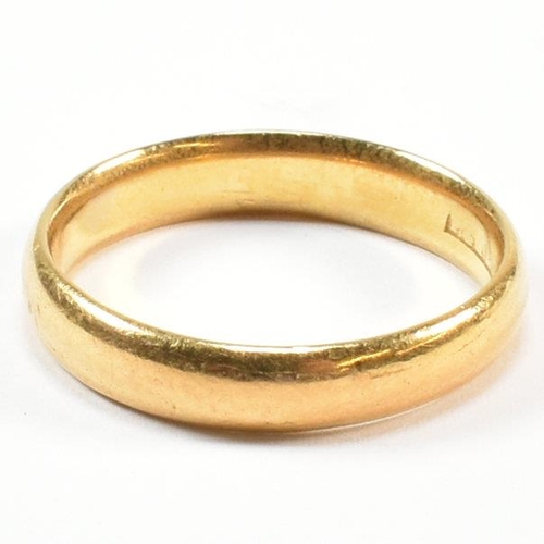 65 - A hallmarked 22ct gold band ring. Hallmarked for Birmingham, 1945. Sponsor's mark rubbed. Size P.5. ... 