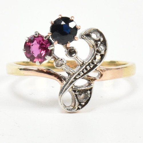 67 - An Art Nouveau ruby, sapphire and diamond ring. The ring having a round mixed cut ruby and sapphire ... 