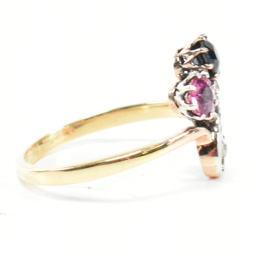 67 - An Art Nouveau ruby, sapphire and diamond ring. The ring having a round mixed cut ruby and sapphire ... 