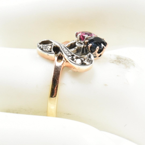 67 - An Art Nouveau ruby, sapphire and diamond ring. The ring having a round mixed cut ruby and sapphire ... 