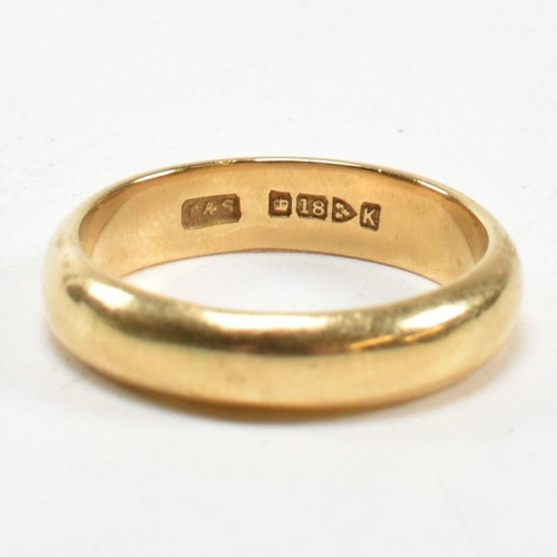 73 - A hallmarked 18ct gold band ring. Hallmarked for Chester, 1960. Sponsor's mark R&S. Size Q.5. Weighs... 