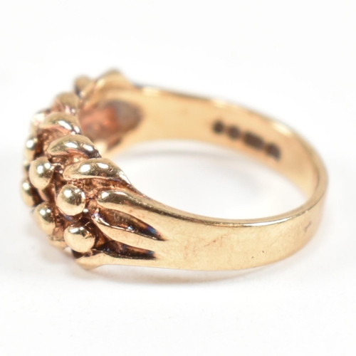 75 - A hallmarked 9ct gold keeper ring. Hallmarked for London, 1981. Sponsor's mark B.J. Weighs 3.0g. All... 