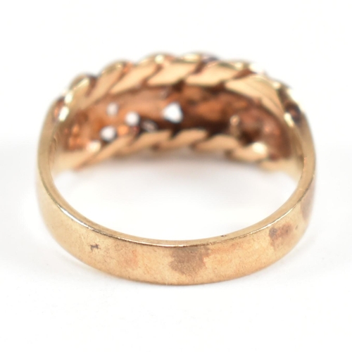 75 - A hallmarked 9ct gold keeper ring. Hallmarked for London, 1981. Sponsor's mark B.J. Weighs 3.0g. All... 