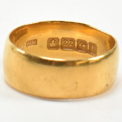 79 - An early 20th century hallmarked 22ct gold band ring. Hallmarked for Birmingham, 1918. Sponsor's mar... 