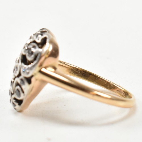 8 - A Victorian pierced diamond heart ring. The Art Nouveau ring having a pierced old cut diamond set he... 