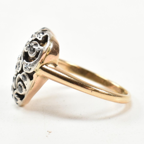 8 - A Victorian pierced diamond heart ring. The Art Nouveau ring having a pierced old cut diamond set he... 