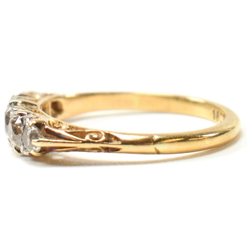 82 - An 18ct gold and diamond five stone ring. The antique 18ct gold ring having five graduating round cu... 