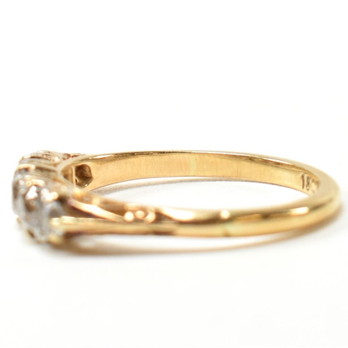 82 - An 18ct gold and diamond five stone ring. The antique 18ct gold ring having five graduating round cu... 