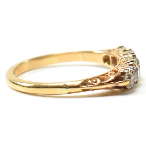 82 - An 18ct gold and diamond five stone ring. The antique 18ct gold ring having five graduating round cu... 