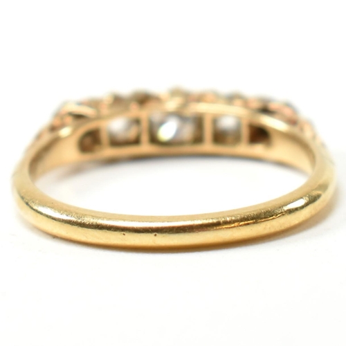 82 - An 18ct gold and diamond five stone ring. The antique 18ct gold ring having five graduating round cu... 