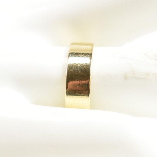 84 - A hallmarked 18ct Welsh gold band ring. The flat 18ct Welsh gold band ring hallmarked for Sheffield,... 