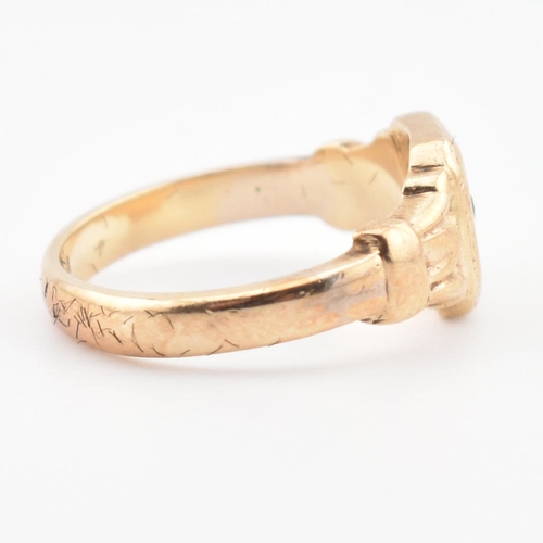 85 - A hallmarked 9ct gold and diamond signet ring. The ring having a star set old cut diamond to acanthu... 