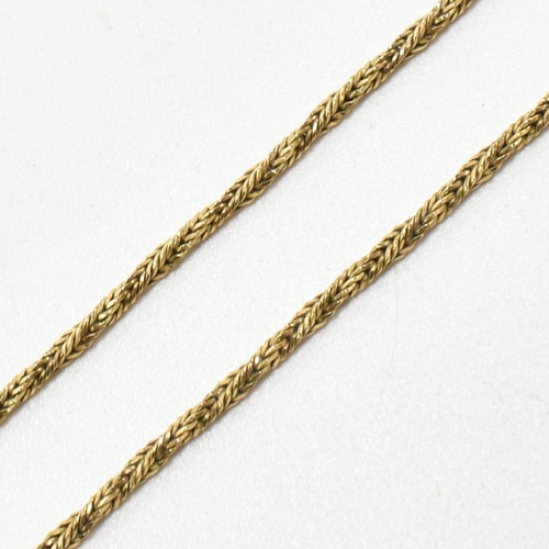 86 - An 18ct gold twisted chain necklace. The twisted chain necklace marked 750 to spring ring clasp. Mea... 