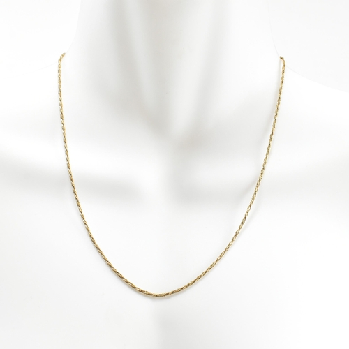 86 - An 18ct gold twisted chain necklace. The twisted chain necklace marked 750 to spring ring clasp. Mea... 