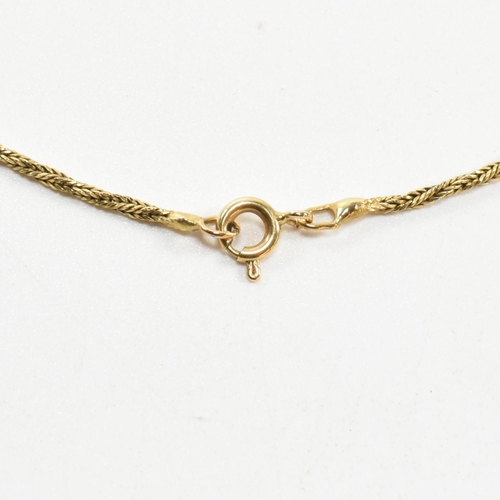 86 - An 18ct gold twisted chain necklace. The twisted chain necklace marked 750 to spring ring clasp. Mea... 